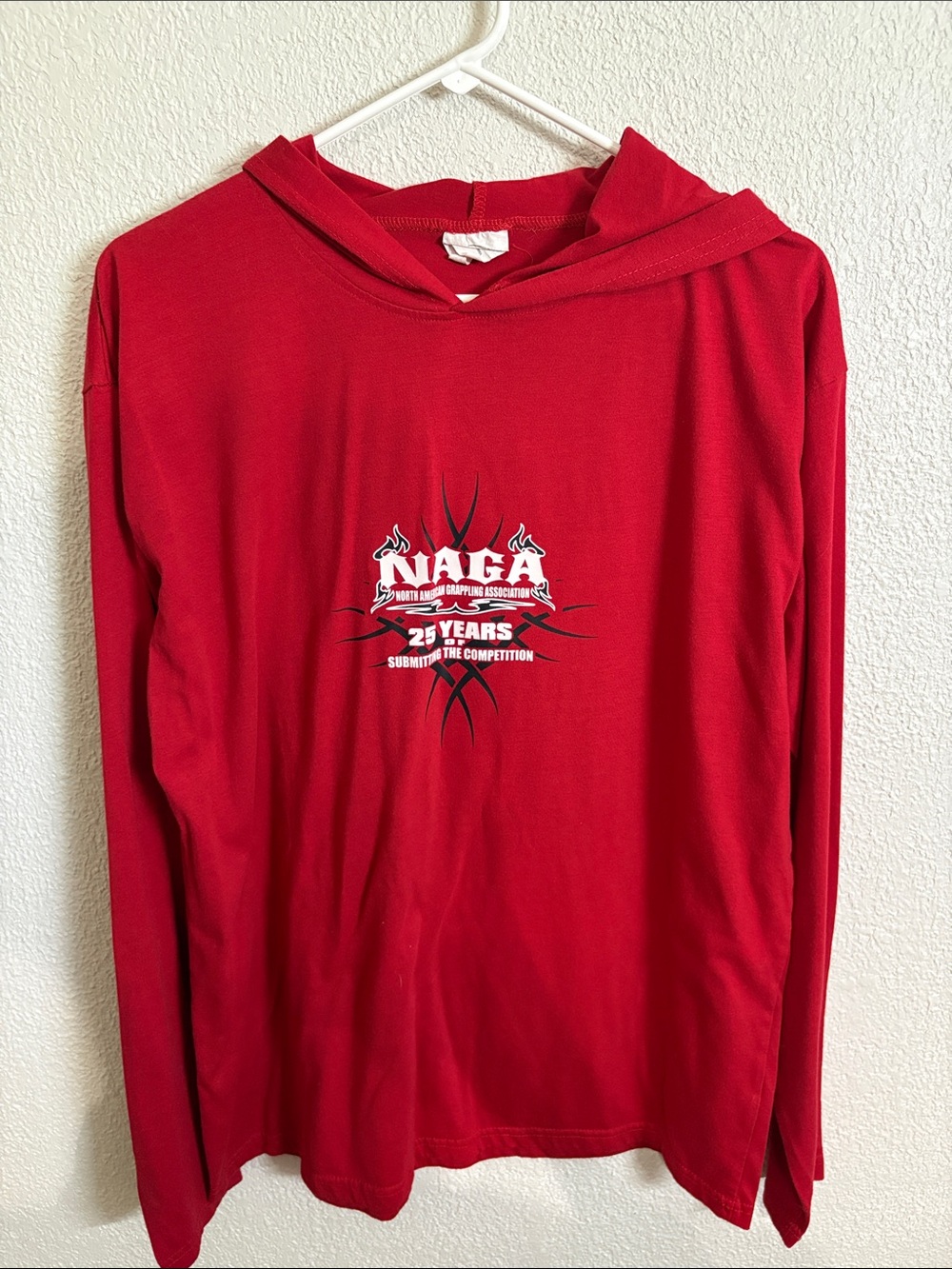 NAGA jiujitsu Red Hooded Long-Sleeve Hooded Shirt. Fits like a Lg.